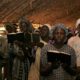 Singing. Church service in Yei, South Sudan.
