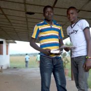 Two christian men on a porch - during break on youth camp