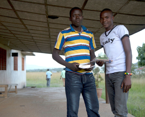 Two christian men on a porch - during break on youth camp