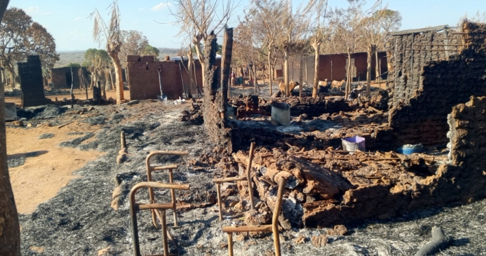 Burnt down houses in Napala Village in Mozambique
